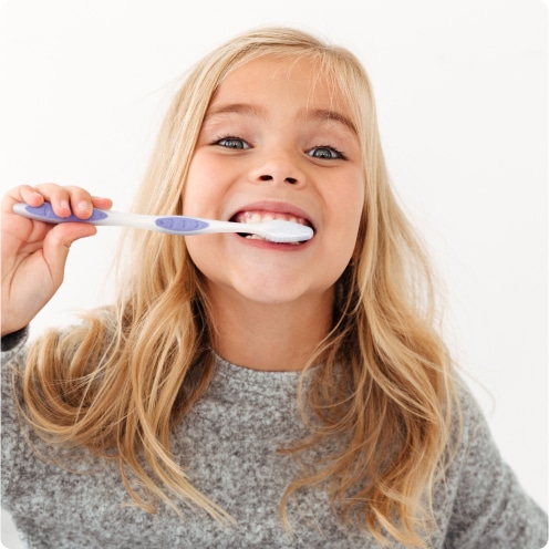 A child brushing a teeth
